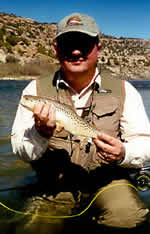 Steve Robbins holding a beautiful brown 